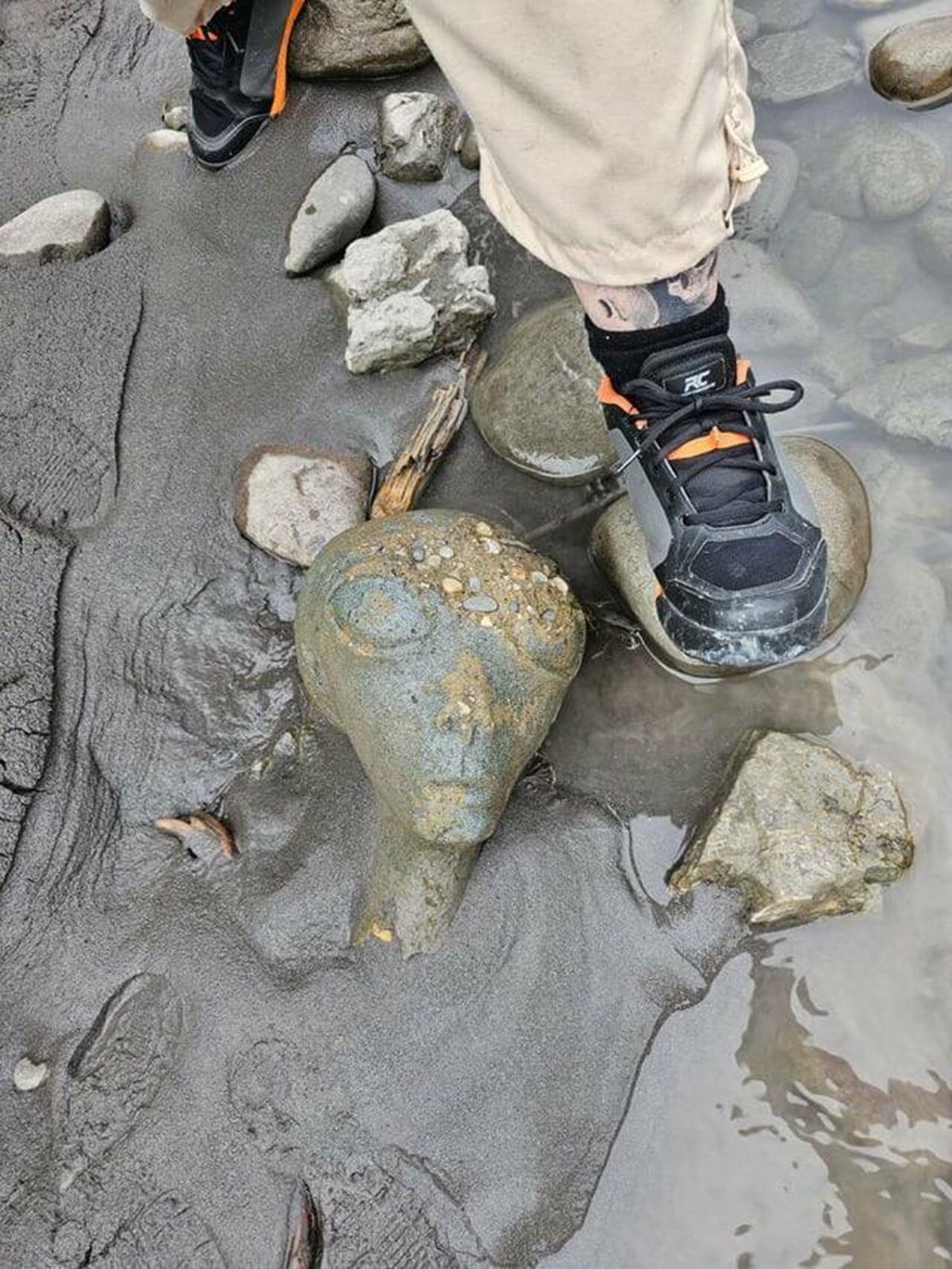 "Found an alien statue head in a riverbed"