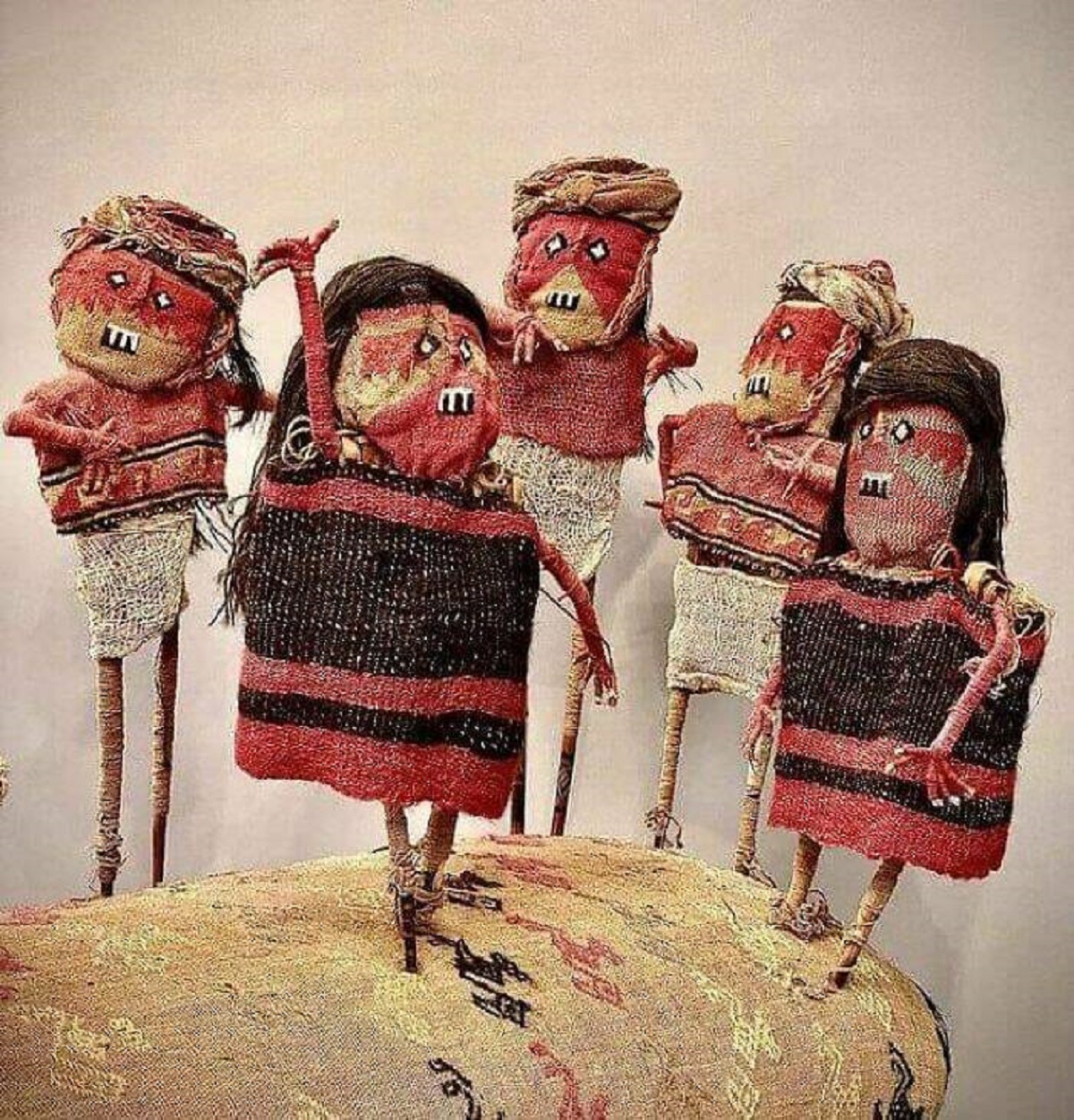 "Group Of Dolls Arranged In A Ceremonial Scene, From A Dry Tomb. Peru, Chancay Culture, C. 900-1400 Ad"