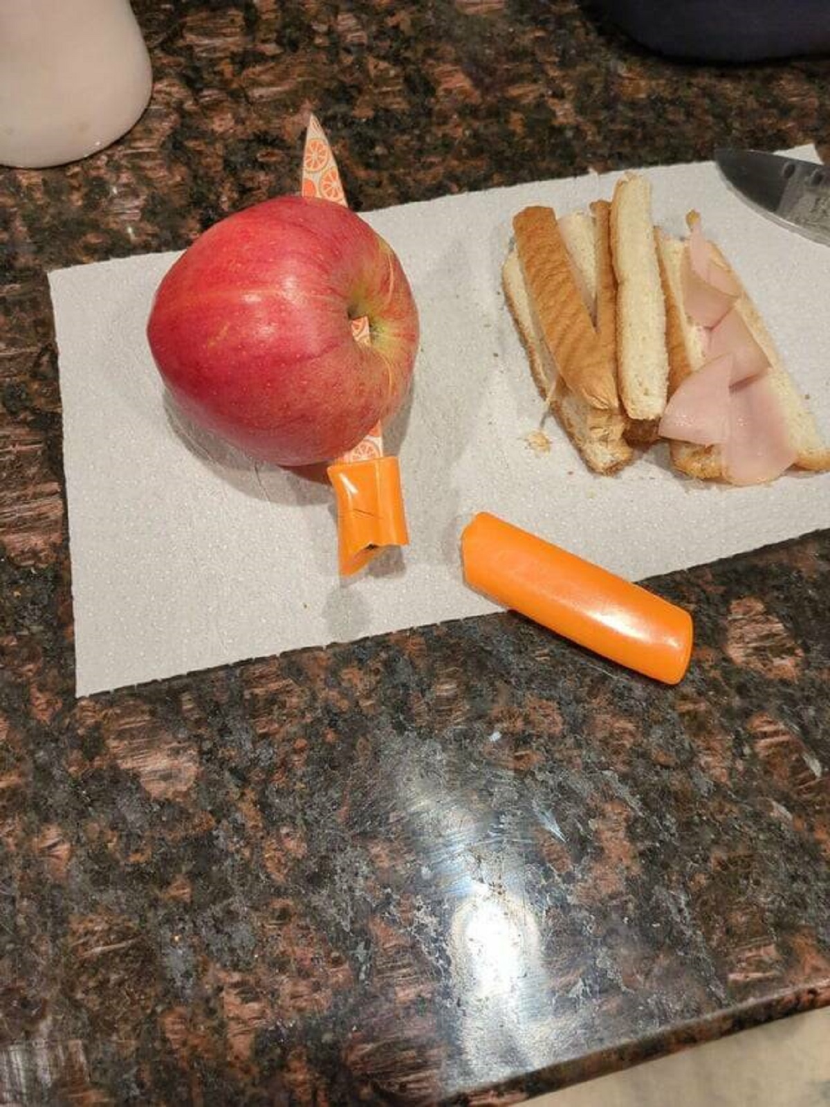 "I tried to use an orange knife to slice an apple"