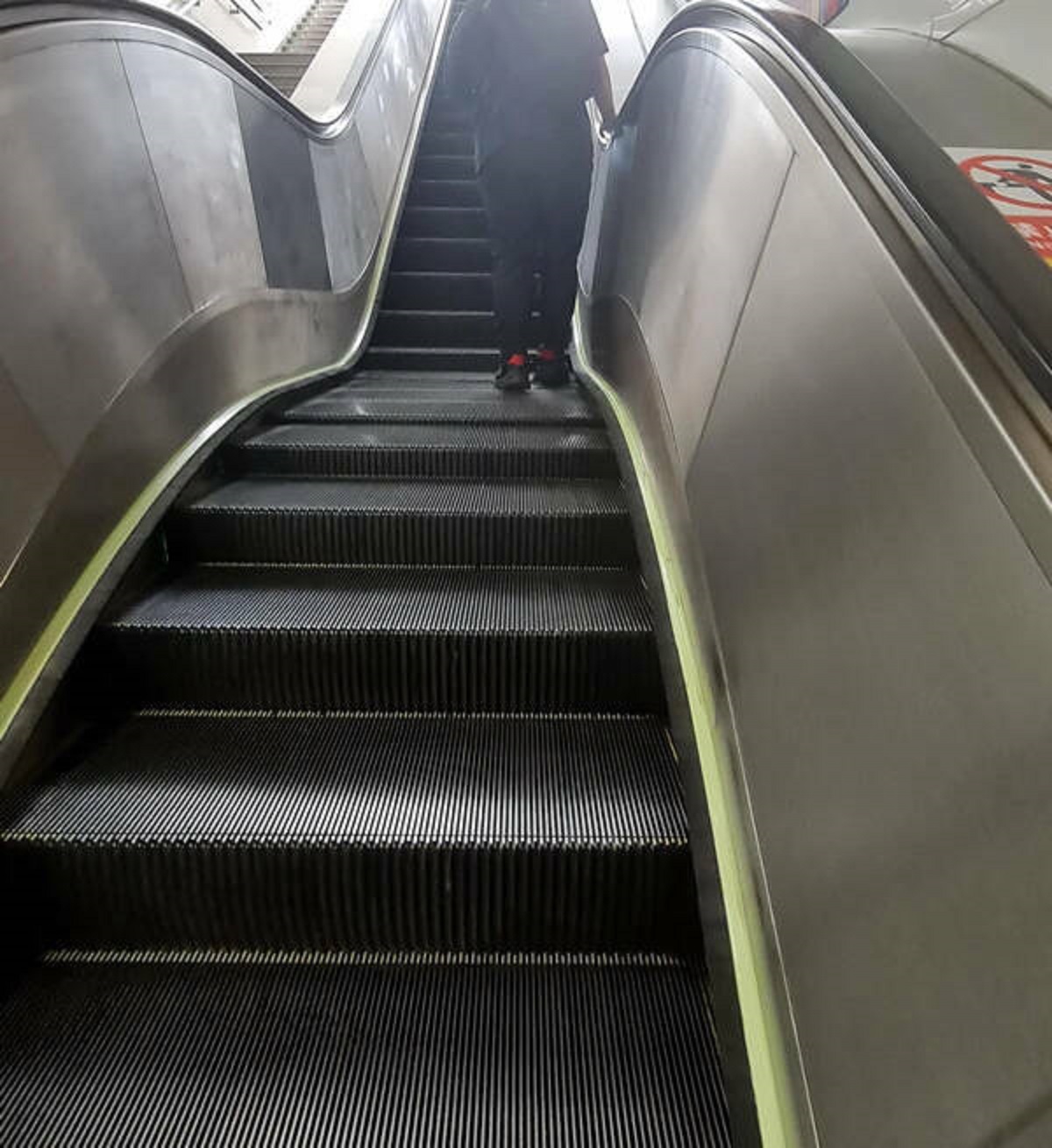 "This escalator has a small landing half way up."