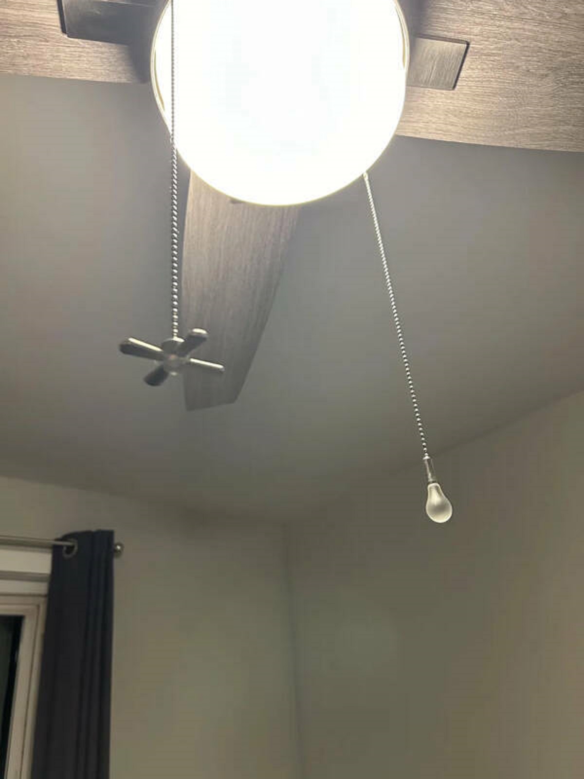 "Ceiling fan has tiny fan and light bulb pull chords to let you know which is which."