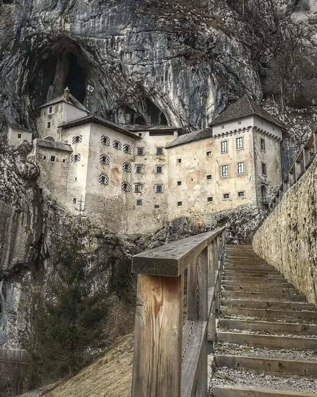 "Predjama Castle in Slovenia has stood on a 123-meter cliff for 800+ years, making it the largest cave castle in the world."