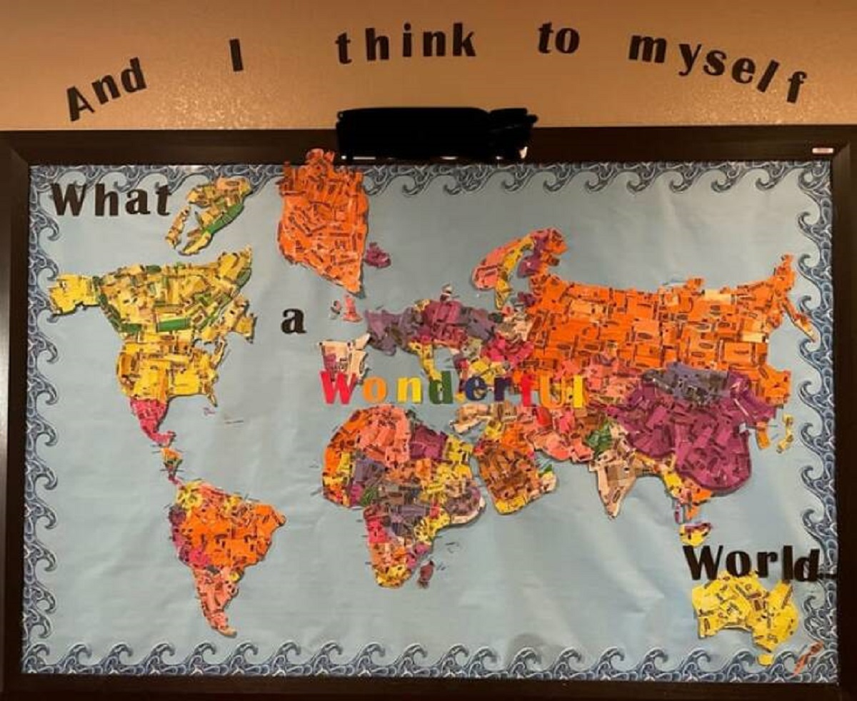 "A world map made entirely of crayon wrappers I made for my preschool class’s board"