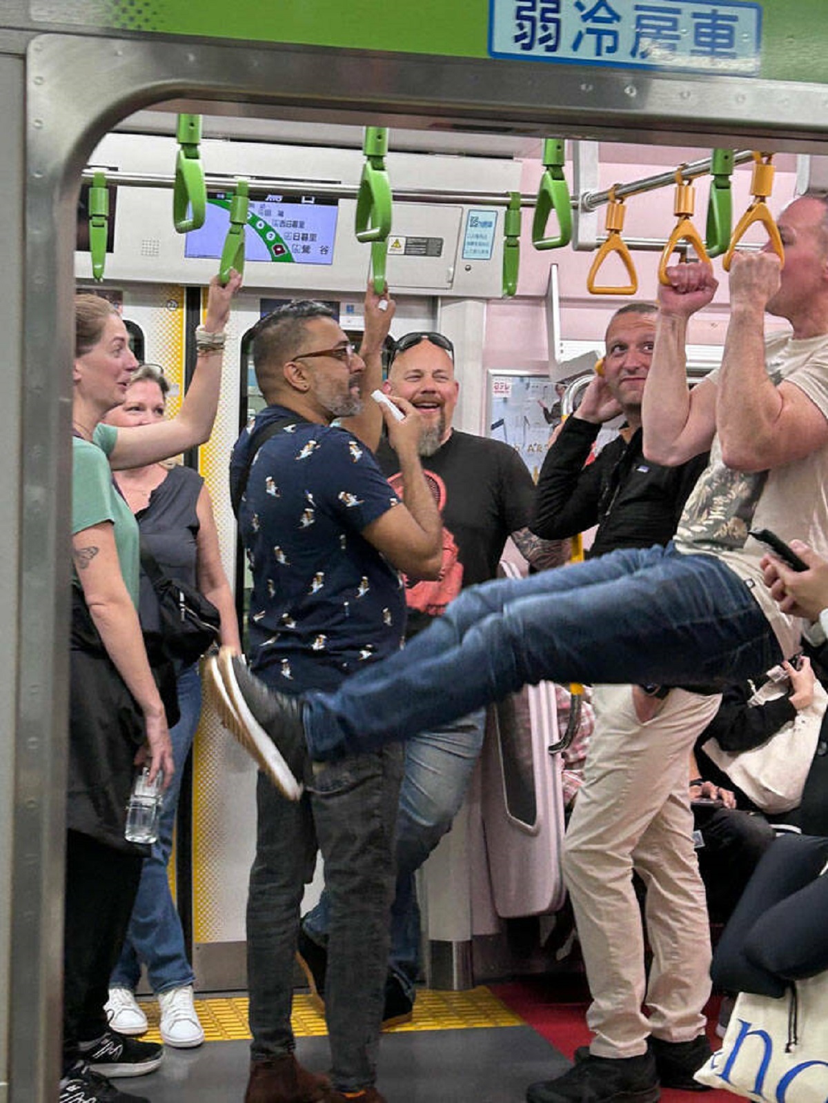 "Tourist Showing Off His Gymnastics Skills In A Japanese Subway"