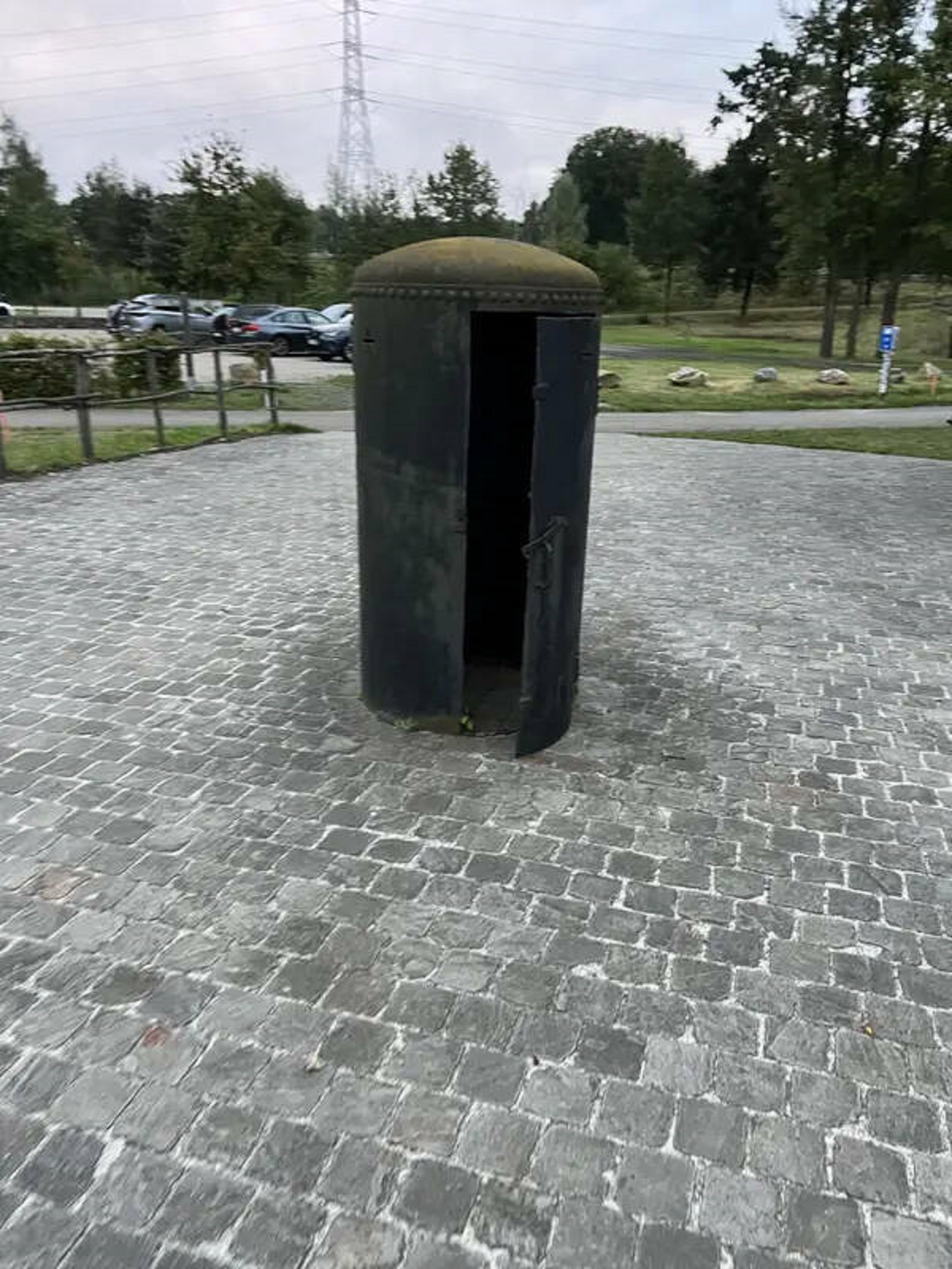 "This 5-foot-tall metal tube at an abandoned train station in Belgium"

A: “It’s similar to this one in “Asch station, Netherlands. It is said to be a one-man air-raid box.”