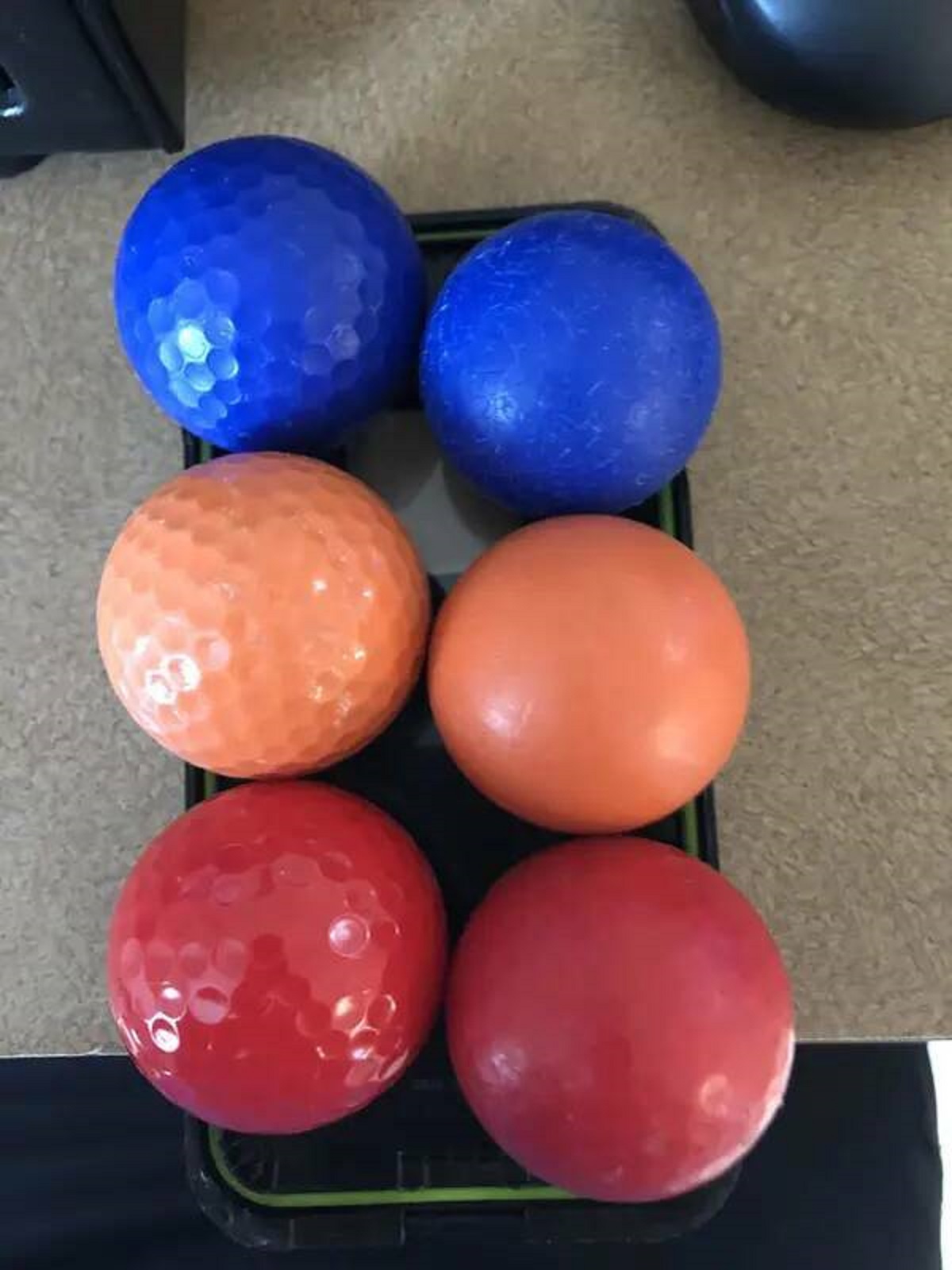 New mini golf balls vs. mini golf balls that have been worn down over the years: