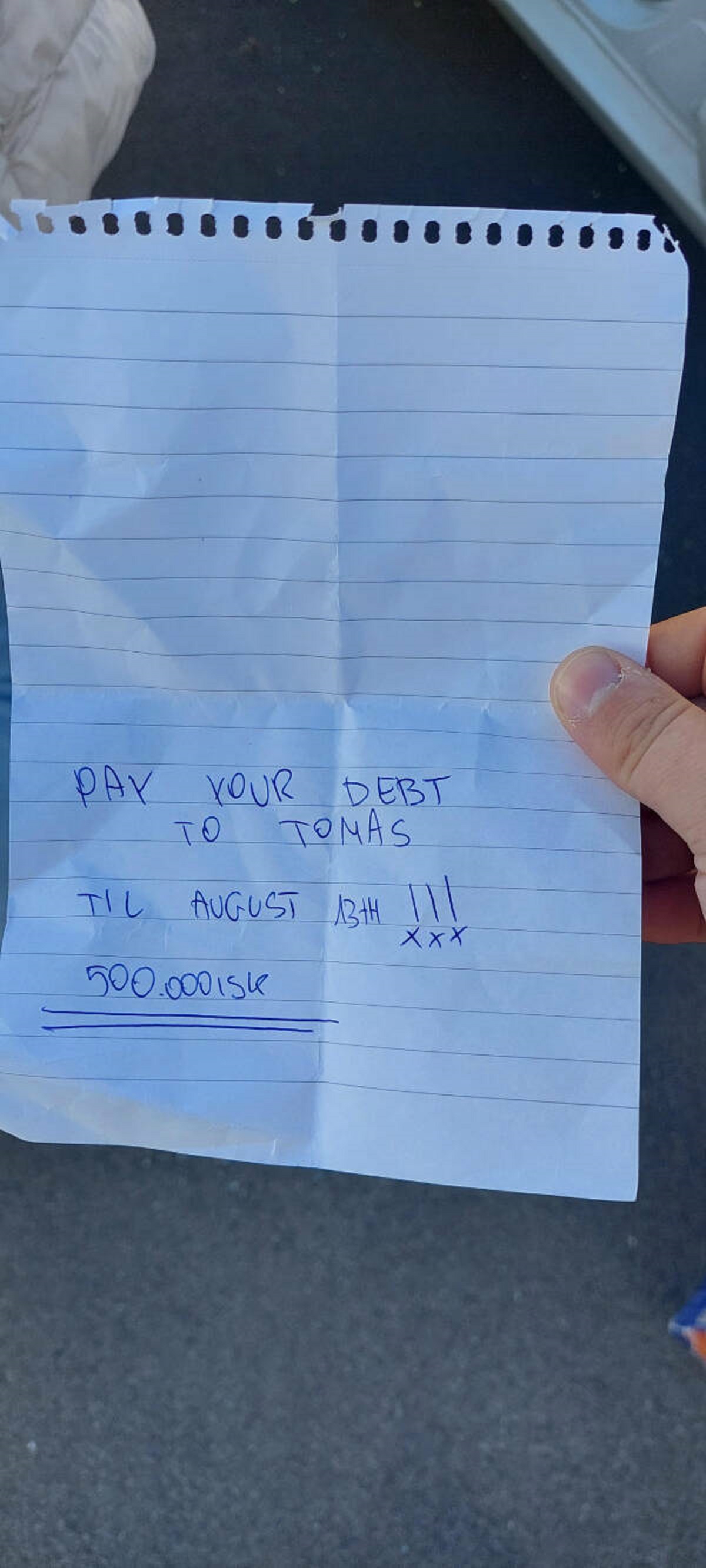 “Came to my car window smashed this morning. I don’t know any Tomas and am not in debt to anyone. 500.000ISK is about 3.650USD.”