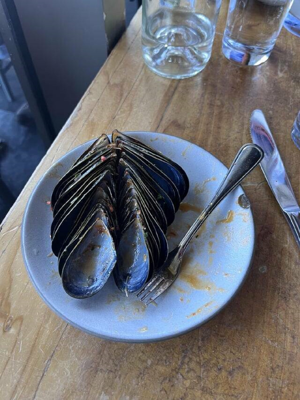 "The way this customer left their mussel shells organized after eating"