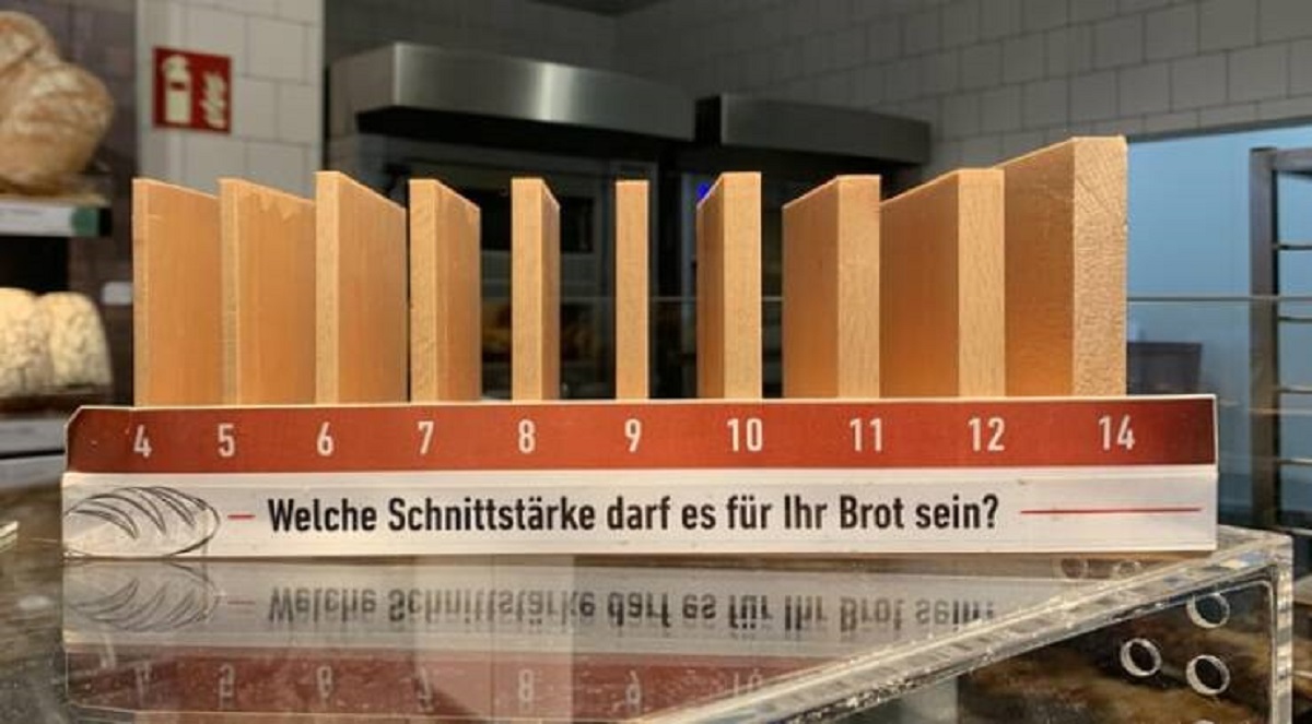 "This device in a german bakery that shows different bread slice sizes"