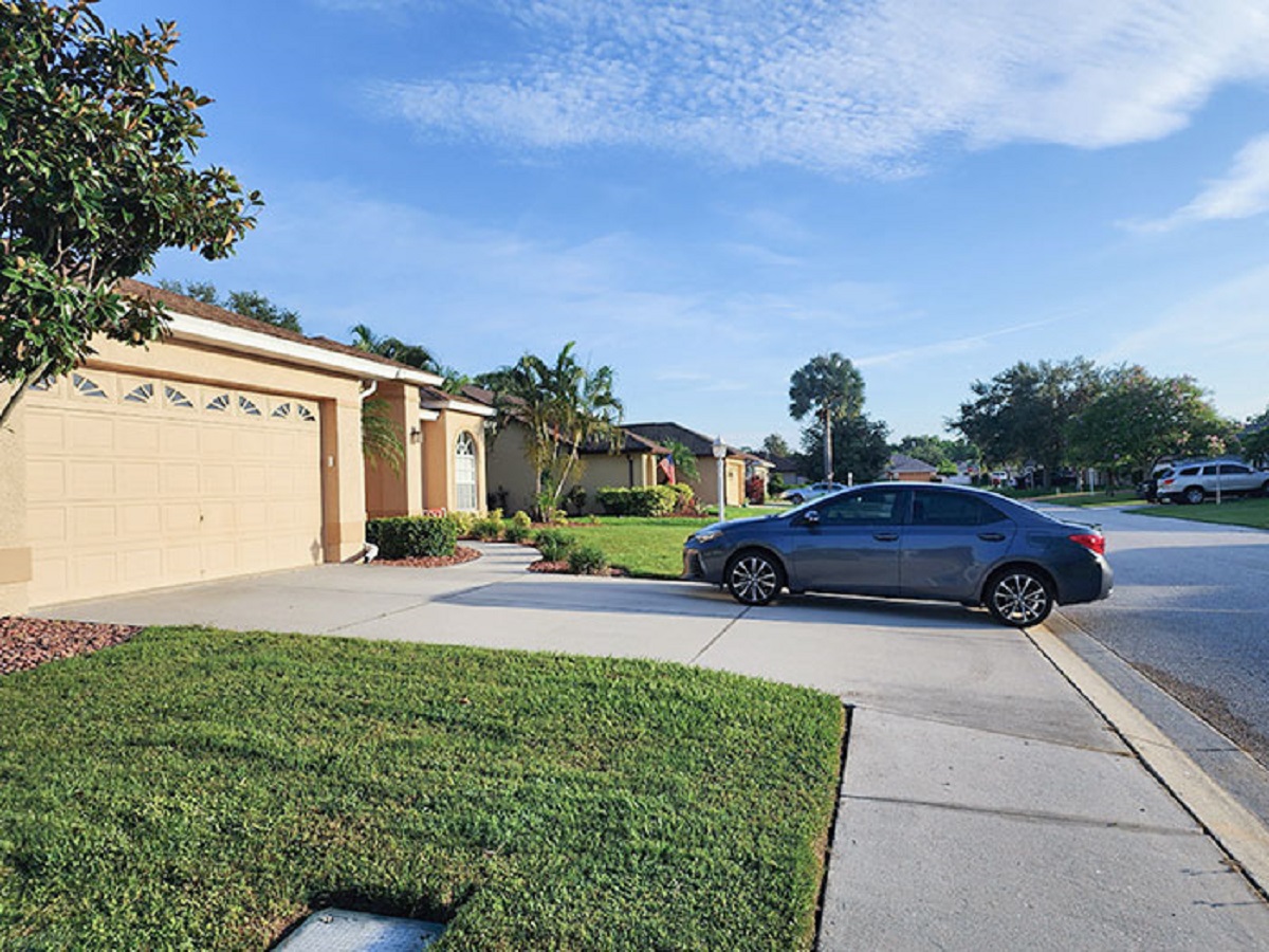 Neighbor Parks Their Car To Purposely Block The Sidewalk, Despite Having Plenty Of Room In Their Driveway