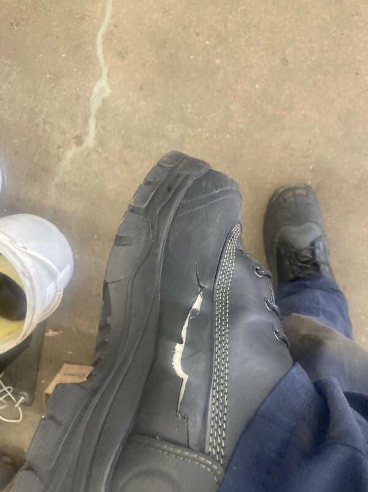 This employee who wore these weatherproof steel toe boots for the first time at work...but it cracked within two hours: