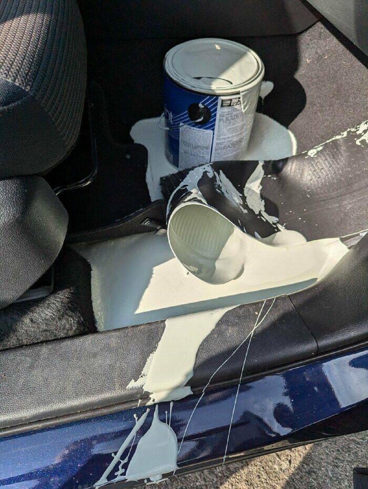 "The Paint Store Guy Didn't Close The Can Properly"

"Bought a car one week ago. Picked up paint while on vacation to paint my mom's house. A teenager working at a paint store didn't close the can properly. That's 1 gallon of slightly greenish-gray wall paint on the floor of my new car."