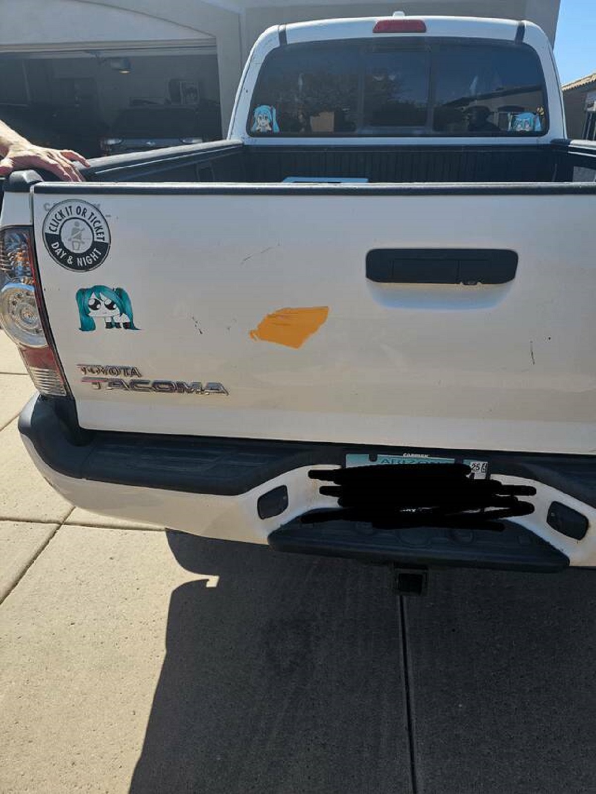 "Came home to find a slice of cheese slapped onto my tailgate"