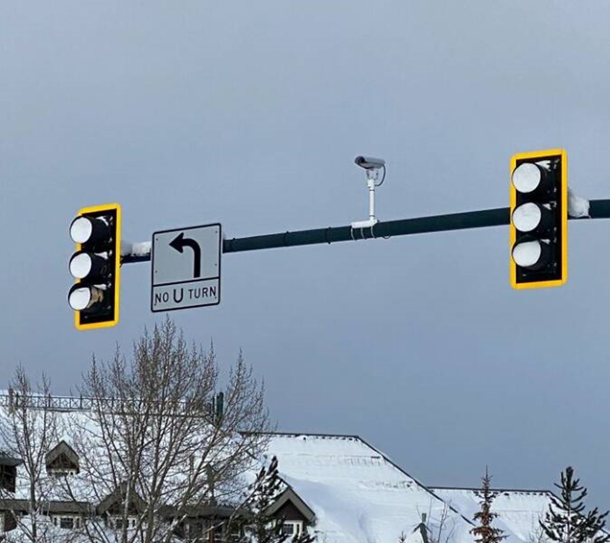 "Stoplights In Lake Tahoe Filled With Snow Due To Not Having The Bottom Cut Out To Prevent Snow Accumulation"