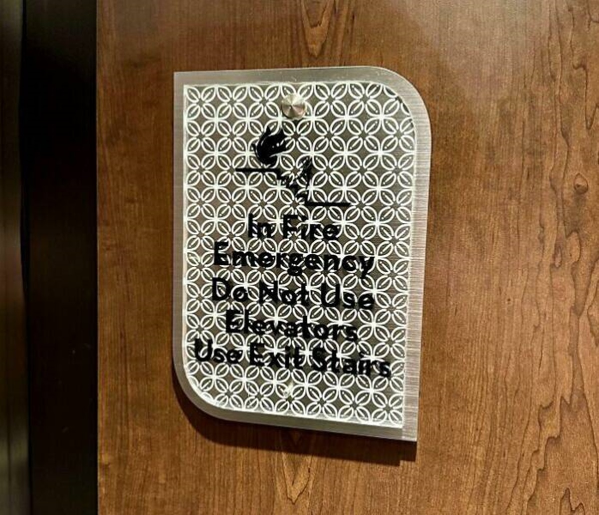 "This Sign In A Hotel Elevator Is A Little Hard To Read"