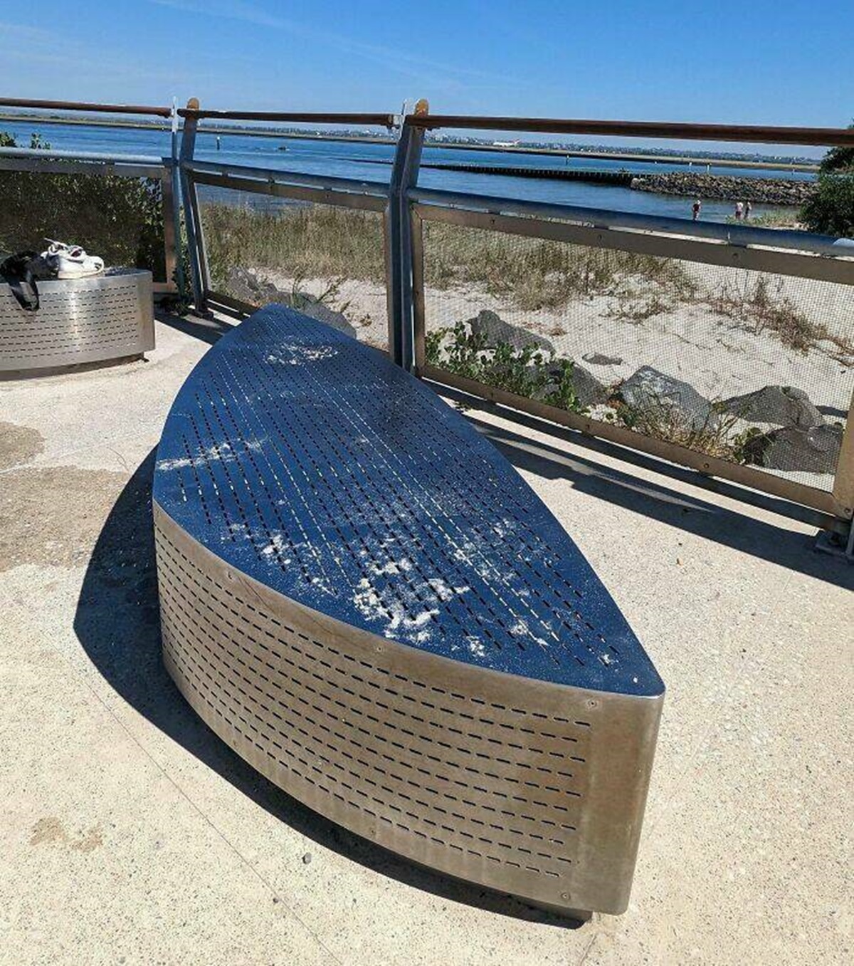 "Stainless Steel Bench At The Beach. The Temperature Today Is 31°C"