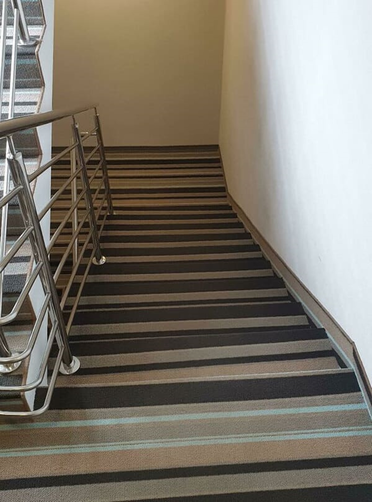 “Striped Carpet On Hotel Stairs. Hard To Use Even After Two Weeks And Completely Sober”