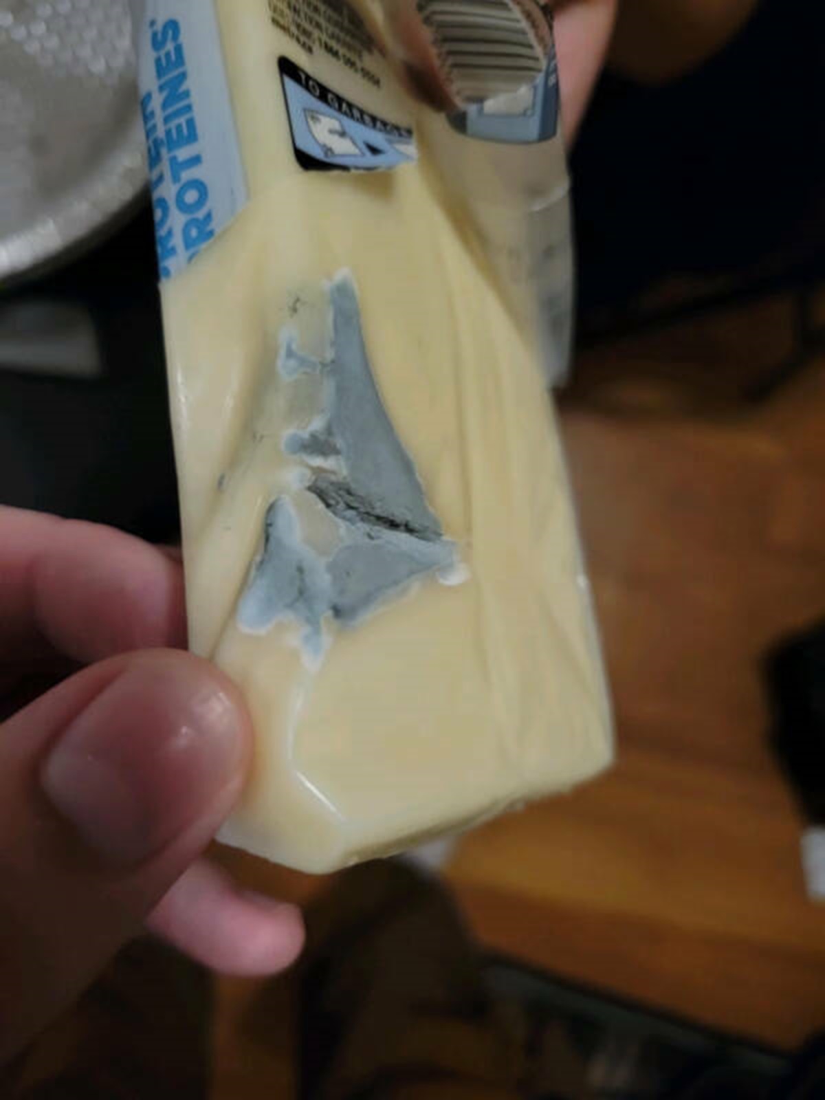 “Had to throw away about half of this block of cheese we just bought.”