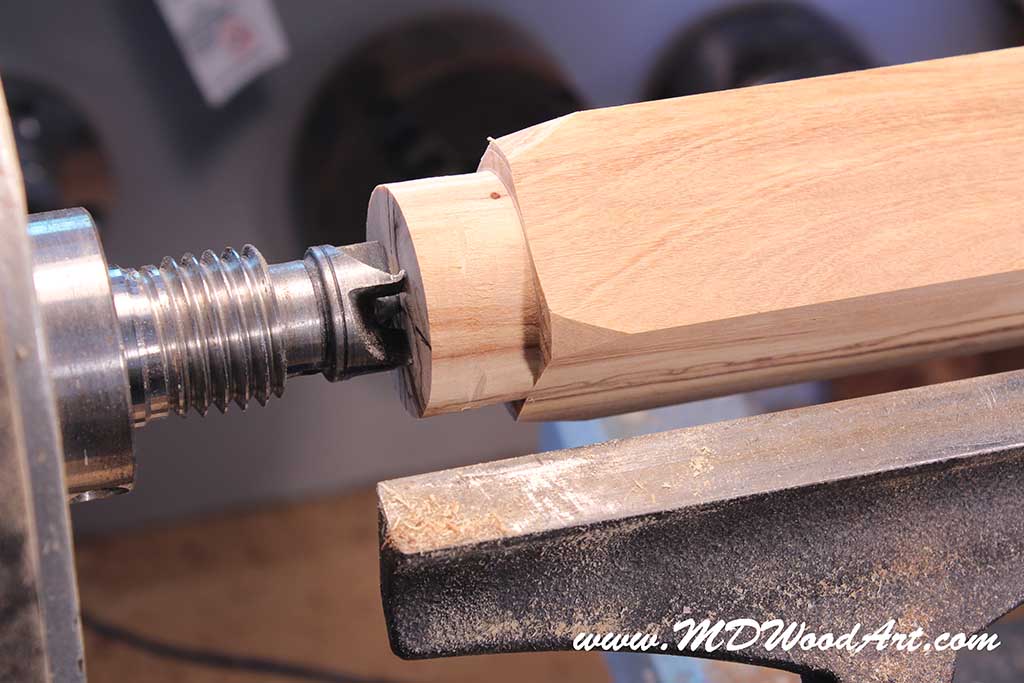 mount between centers form a tenon for the chuck
