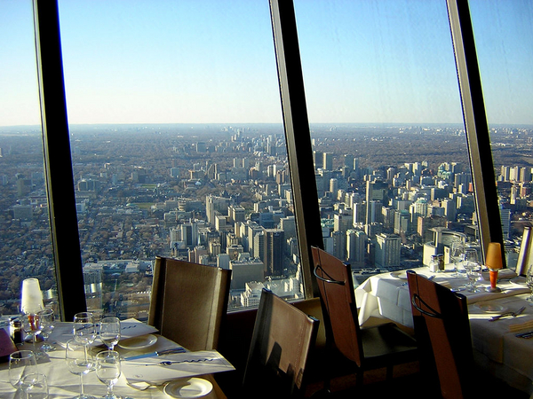 At Toronto's 360 Restaurant, dining is brought to a whole different level. Firstly, because the restaurant sits 351 meters (1151 ft) above ground on top of the CN Tower. Secondly, because it slowly revolves to give you 360 degree views of the magnificent city.  After major remodeling in 1995, the restaurant is no longer just a tourist magnet but a truly sophisticated dining experience. Some say the menu has left them with taste buds unsatisfied and wallets emptied. But even if you're not satisfied with food, the bill pays for the ticket to the observation deck without queuing. Just pick a cloudless evening and take in the splendor of Toronto from up high, preferably having a glass of wine from the restaurant's award-winning "cellar in the sky". 