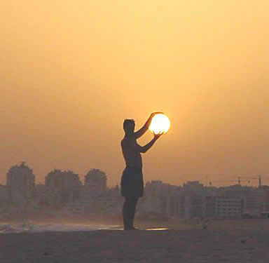 Man holding the sun