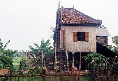 A Cambodian couple saws their house in half in order to make their divorce easier under the law