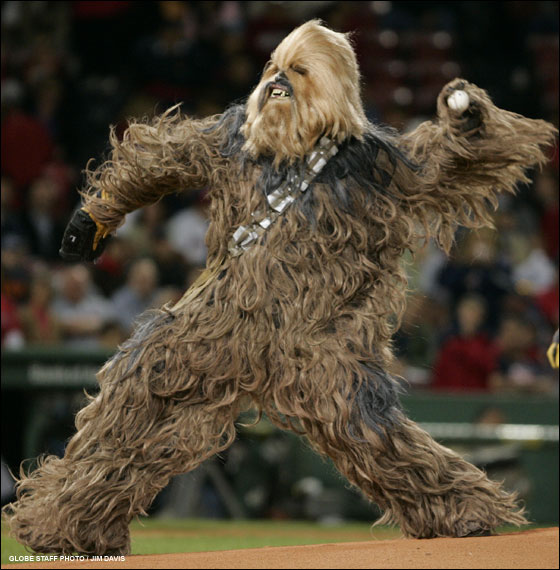 this is a picture of chewbacca from star wars  playing baseball