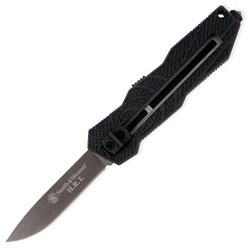 Smith and Wesson assisted OTF. its a tight deep pocket backup blade if u lose your main TDK...