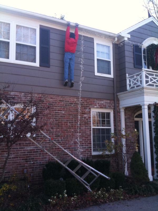 Best Christmas decoration ever! The guy that put this up said he had to take it down after one week because too many people were yelling at his house and trying to climb the ladder to get him down!