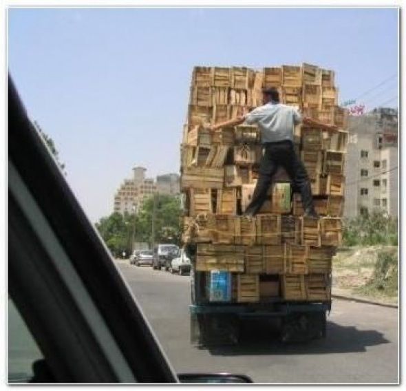 preventing the load from falling out of the truck.