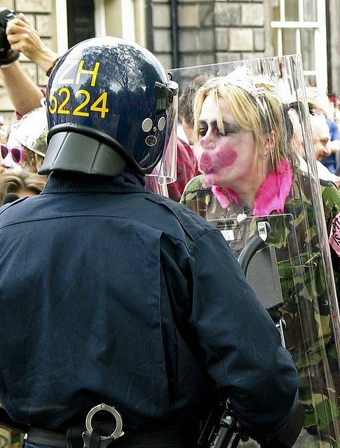 Another Juggalo tries to kiss an officer of the law!