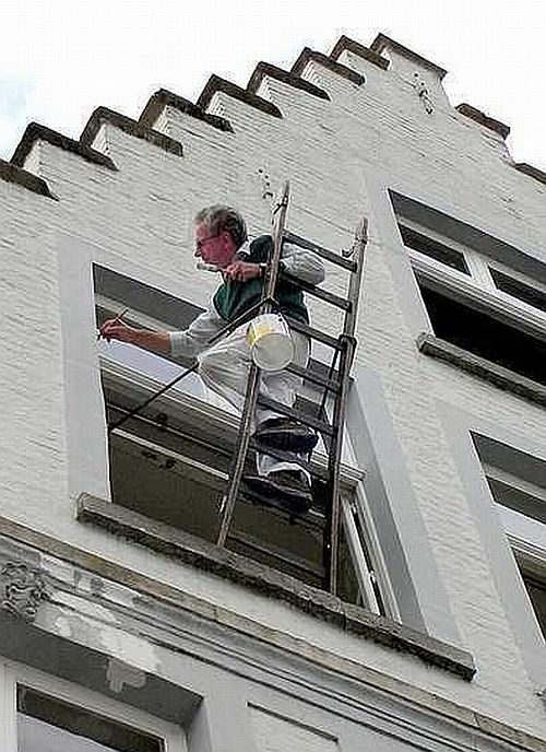 Must also have a firm grasp on that paintbrush when the ladder falls!