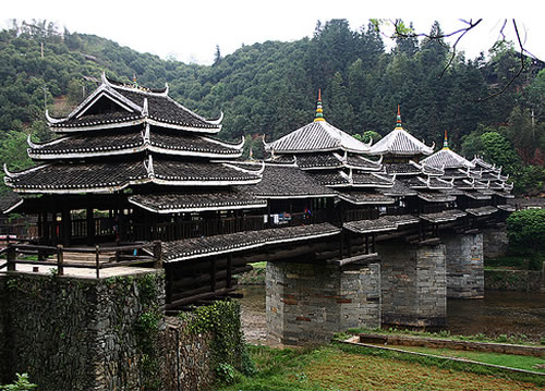 Chengyang Bridge: located in China, the Dong people are excellent bridge builders.The bridge is about 100 years old, and like all wind and rain bridges, it was built without a single nail.