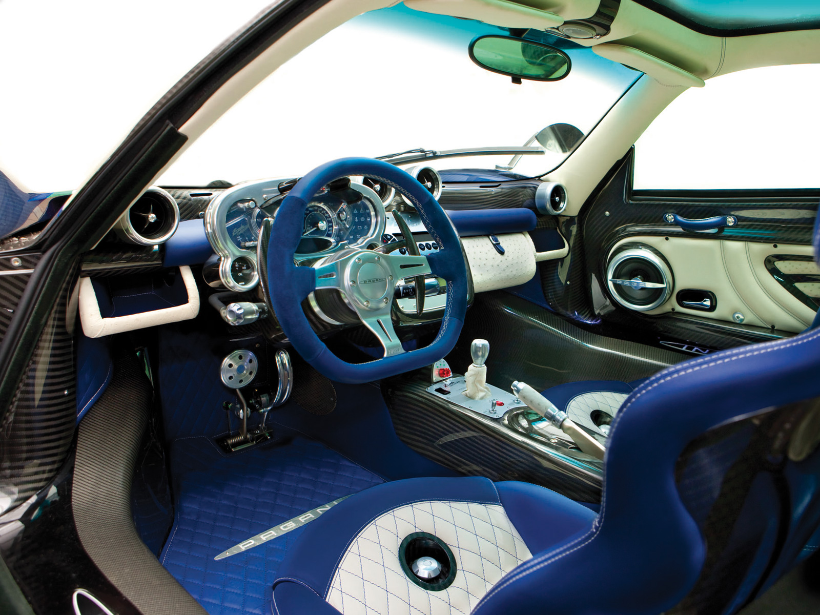 The Pagani Zonda Tricolore is a 2 door coupe with a starting MSRP of 1,960,000Top Speed 220 MPH, 0-60 3.4 in Seconds