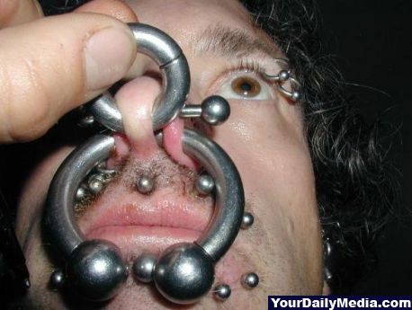 This guy has some crazy peircings.