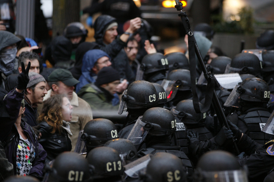 A protester gets sprayed in the face with pepper spray at an Occupy Portland protest. 