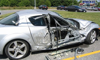 This is what happens when an M1 Abrams tank accidentally reverses into a Mazda RX-8.