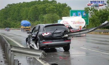 This Audi Q7 hit a guardrail in Romania which then tore through the car.