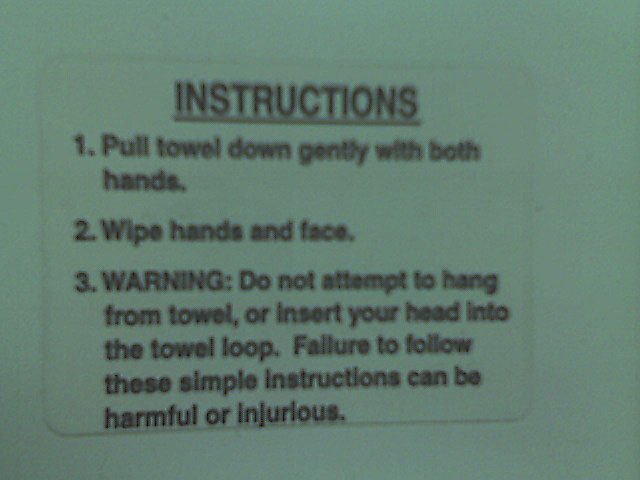 This was the warning sticker on a towel in a gas station bathroom.  You know they had to put that warning up because somebody actual did that.  Sorry for low quality - taken with cell phone.