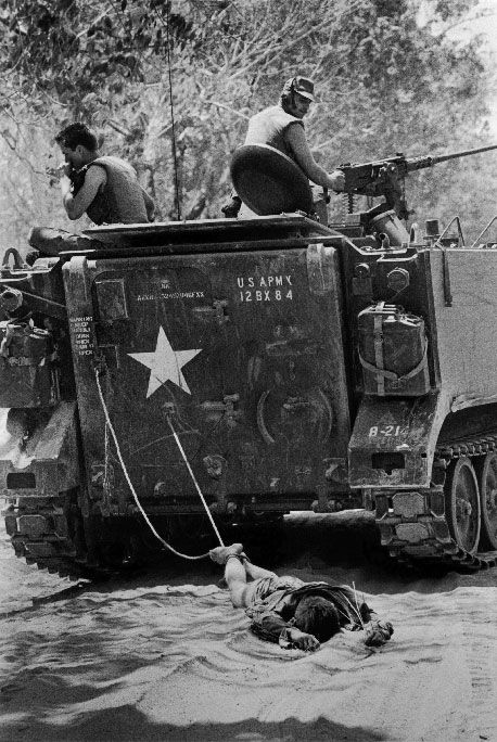americans dragging dead vietcong