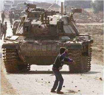 child throwing rock at tank
