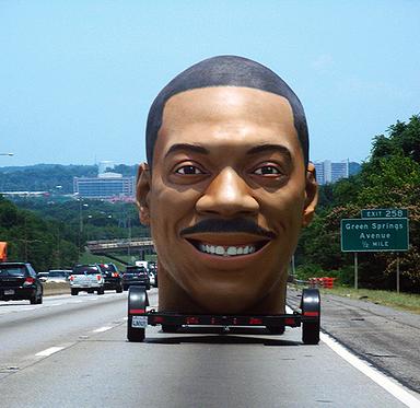 A giant rendition of Eddie Murphy's face on a trailer. Wtf?