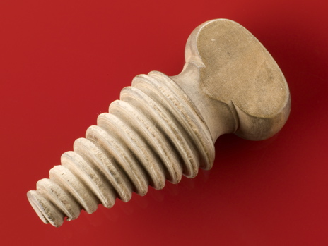 Mouth Gag (1880s-1910s) This wooden, screw-shaped mouth gag would be inserted into an anesthetized patient's mouth to keep the airway open.