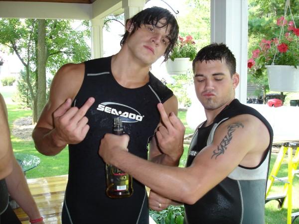 Me and my best friend drinking whiskey in wetsuits
