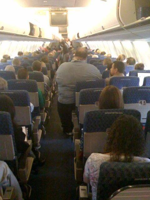 fat guy on plane