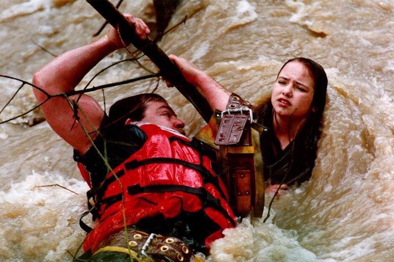 1997:  Annie Wells – “Firefighter Rescues Teenager.”  On Feb 4, 1996, Wells snapped this picture of Santa Rosa firefighter Don Wells grabbing a tree after diving into flooded Matanzas Creek to rescue 15 year old Marglyn Paseka from the rapidly rising water.  Paseka got too close to the swollen creek that ran past the Bennet Valley Apartment Complex where she lived, and fell in.  Wells was able to secure a safety harness around Paseka who was then pulled to safety.