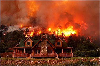 2003:  Rocky Mountain News photography staff – “Colorado Wildfires.”