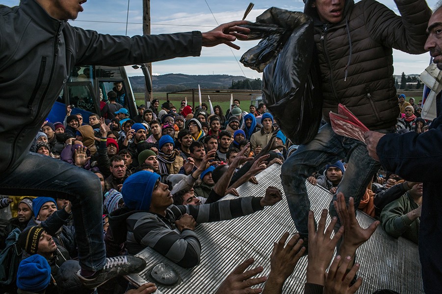 2016 (2):  November 28, 2015. Refugees from Pakistan, Bangladesh, Morocco, Algeria and Somalia struggling for donations of water, blankets, diapers and some clothes on their 10th day encamped near the border in Idomeni, Greece. They were not allowed to cross into Macedonia; only refugees from Afghanistan, Iraq and Syria were allowed to cross and continue their journeys.