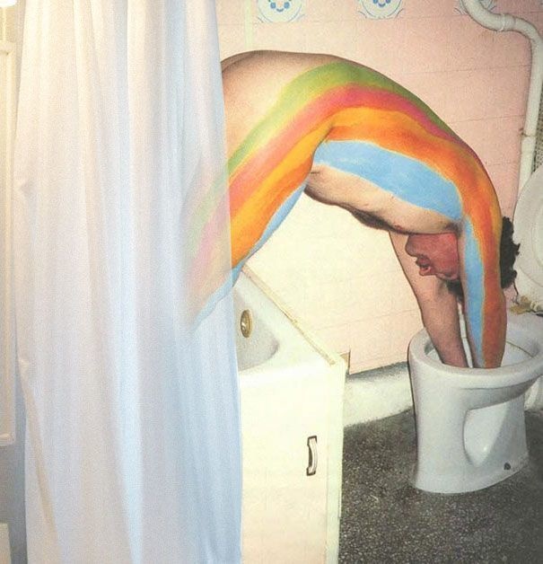 naked dude with rainbow lines diving into the toilet