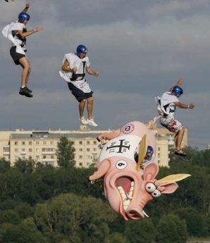 Flugpig Ordo Teutonicus team perform during the Red Bull Flugtag Russia 2009 on the outskirts of Moscow, August 9, 2009. Enthusiasts competed to fly the longest distance in self-made aircrafts in an attempt to win the Flugtag contest
